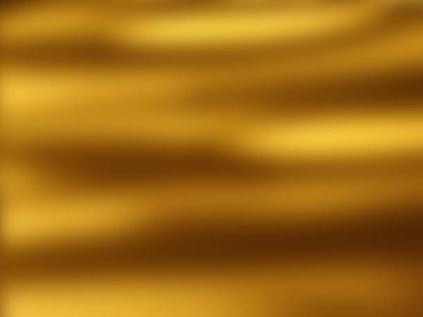istock Golden soft blurred background with shadows and highlights 1346405423