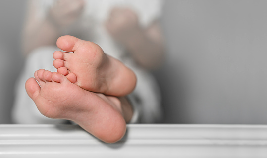 Close-up of child feet