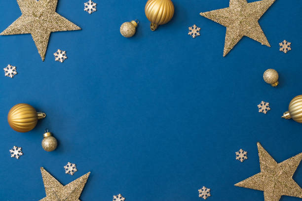 istock Christmas holiday composition. Flat lay frame with christmas balls and decorations on a blue background 1346406935