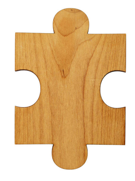 one piece of wooden puzzle on a white background stock photo