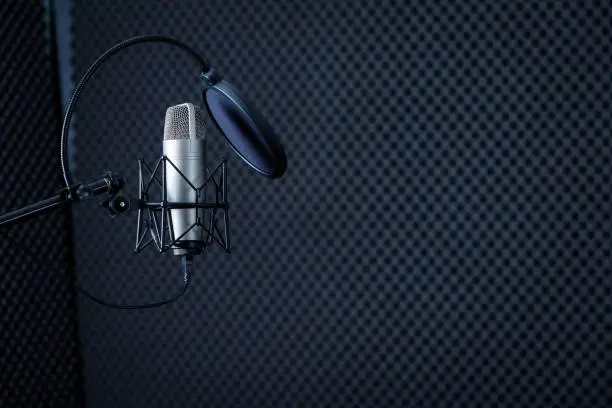 Photo of Professional Microphone in Recording Studio with  blank copy space background