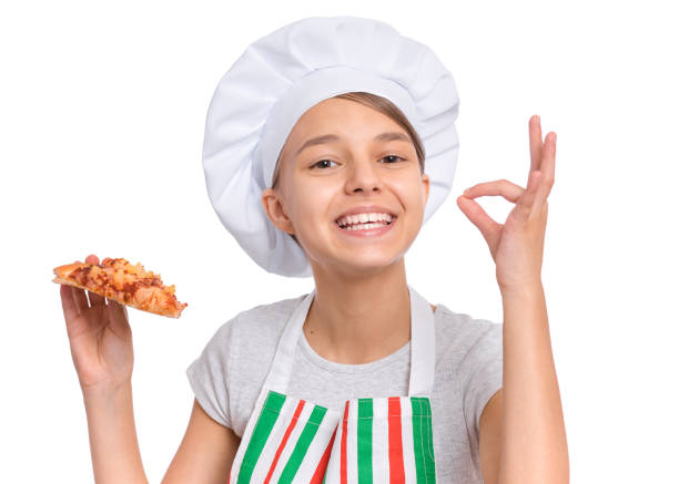 Girl chef holding pizza on white