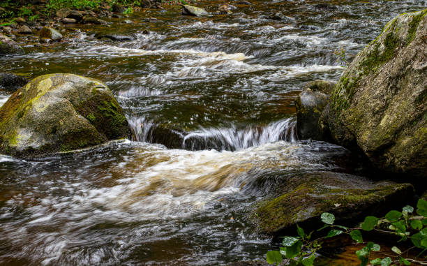 istock water flowing over rocks in willard brook 1346415987