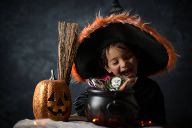 istock young child dressed as a wizard in a halloween setting 1346420129