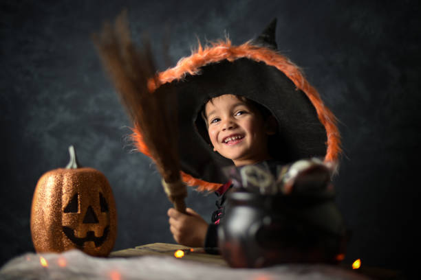 istock young child dressed as a wizard in a halloween setting 1346420158