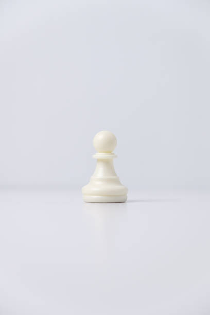istock isolated white pawn chess piece on white background 1346425255