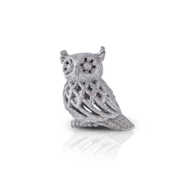 istock Christmas tree decoration in the form of an owl covered with silver sequins 1346429447