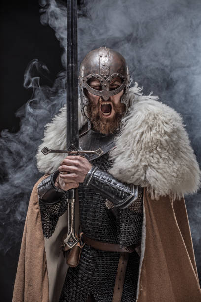 istock Weapon wielding viking warrior in studio shot 1346433545