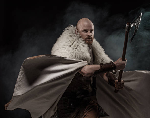 istock Weapon wielding viking warrior in studio shot 1346433546