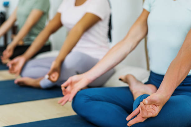 istock Indoor yoga class for a small group 1346434003