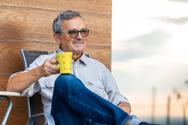 istock Mature Man Relaxing With a Cup of Coffee 1346434028