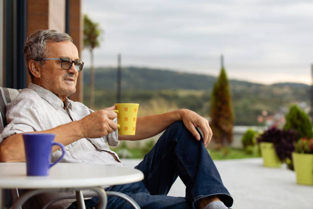 istock Mature Man Relaxing With a Cup of Coffee 1346434030