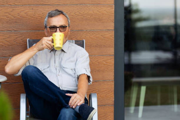 istock Mature Man Relaxing With a Cup of Coffee 1346434032