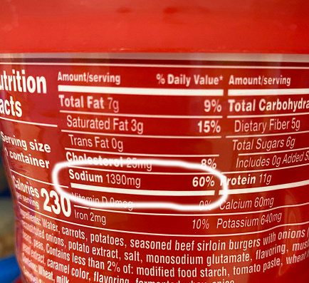 Product nutrition label with emphasis on high sodium content. The FDA wants food manufacturers to cut back on sodium as Americans are eating too much salt.