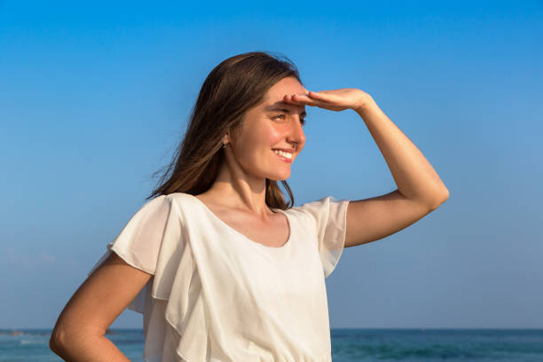 istock Woman on a tropical beach 1346440828