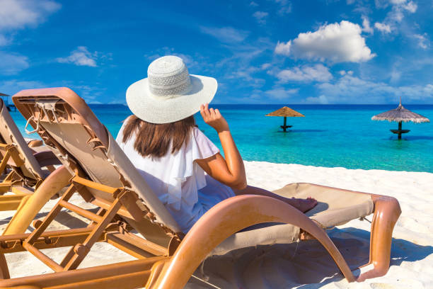 istock Woman lying in sunbed 1346442572