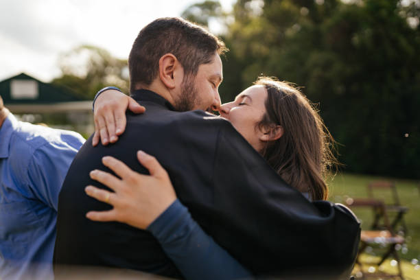 istock Couple hugging at graduation 1346443408