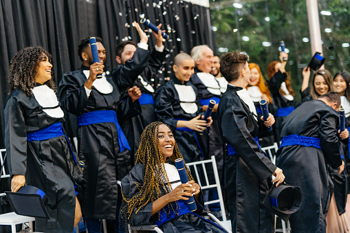 graduates celebrating