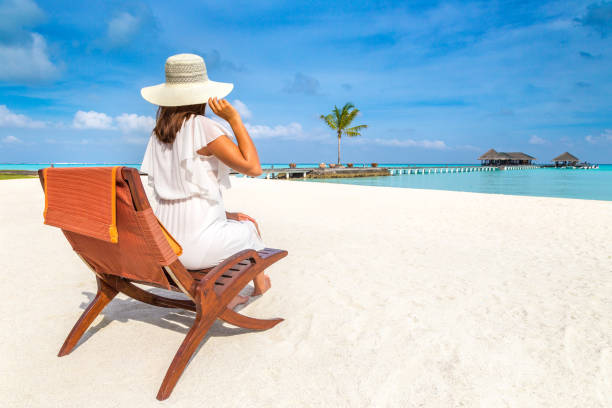 istock Woman lying in sunbed 1346449042