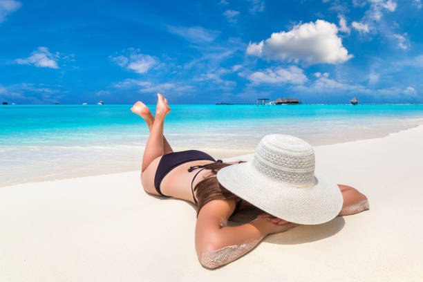 istock Woman at tropical beach 1346449743