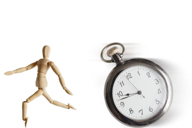 istock A drawing doll running away from a chasing pocket watch 1346450396