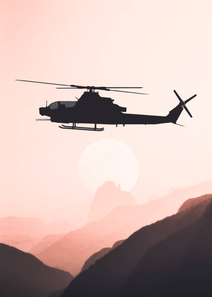 istock American attack helicopter silhouette in the flight 1346450516