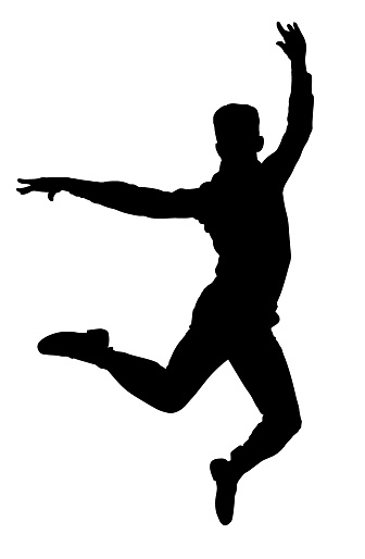 Silhouette of male dancer performing ballet jump