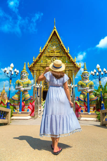 istock Woman at Wat Plai Laem Temple, Samui 1346454837