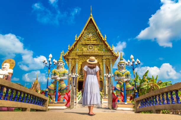 istock Woman at Wat Plai Laem Temple, Samui 1346454876