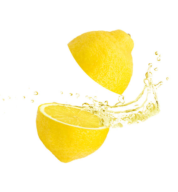 istock Lemon juice splashing  isolated on white 1346461876