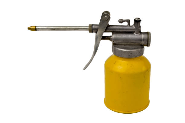 istock Oiler with hand pump isolated on white background 1346466575