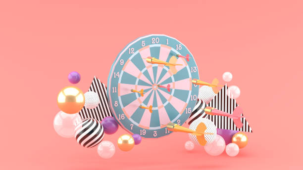 istock Darts and colorful balls on the pink background.-3d rendering. 1346466673