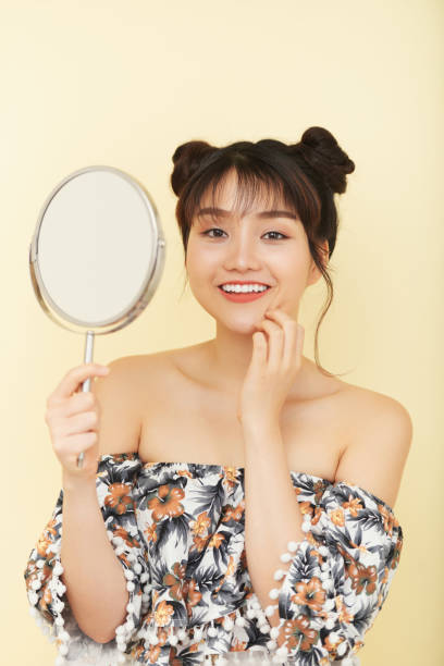 istock Excited Woman Holding Magnifying Glass 1346467896