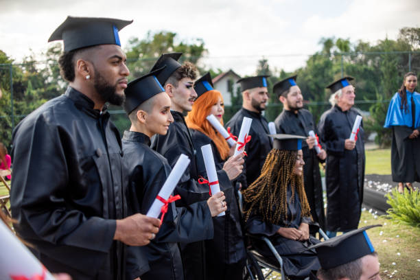 istock Group of graduates on graduation day 1346471488