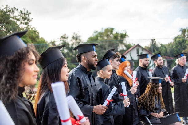 istock Group of graduates on graduation day 1346471498