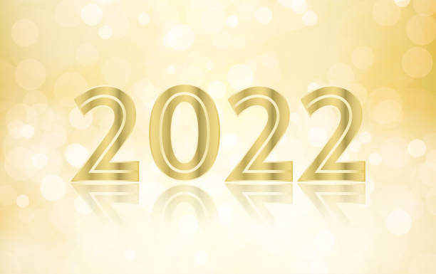 istock Metallic golden brown colored text 2022  over shining beige or gold festive glowing glittering horizontal vector backgrounds for Happy New Year greeting cards, posters and banners 1346473685