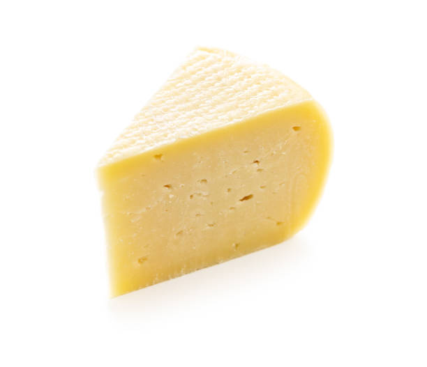 istock Block of hard cheese. 1346476009