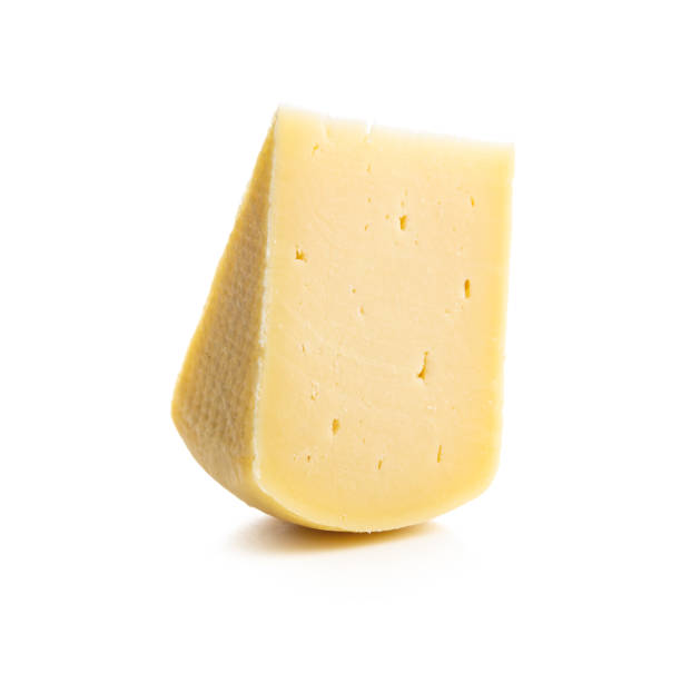 Block of hard cheese. Block of hard cheese isolated on white background. portion cut out cheese part of stock pictures, royalty-free photos & images