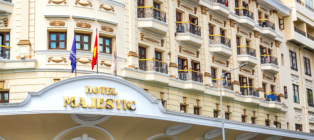 Ho Chi Minh City, Vietnam - October 10th, 2021: Palace royal along a busy boulevard with French architectural style decorate many window attracts business travelers to resort in Ho Chi Minh, Vietnam