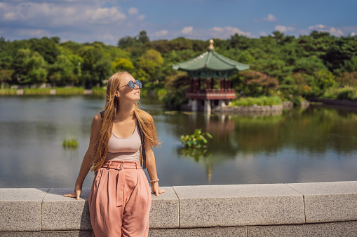 Woman tourist in korea. Korean palace grounds in Seoul, South Korea. Travel to Korea concept.