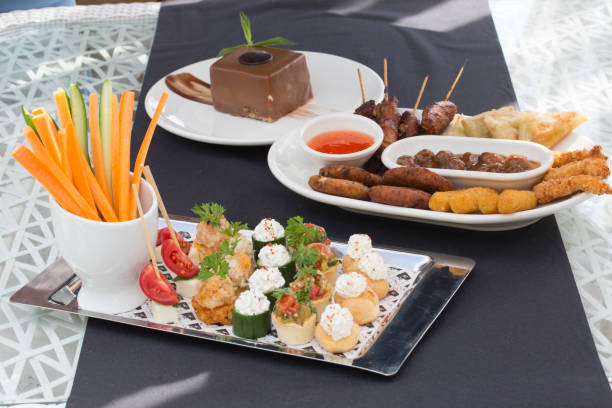 istock snack food and chocolate on plate on table, salad 1346479941