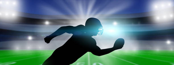 istock American Football player on stadium background. 1346480025