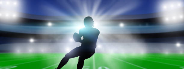 istock American Football player on stadium background. 1346480040