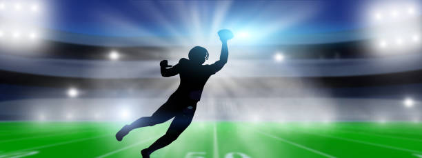 istock American Football player on stadium background. 1346480050