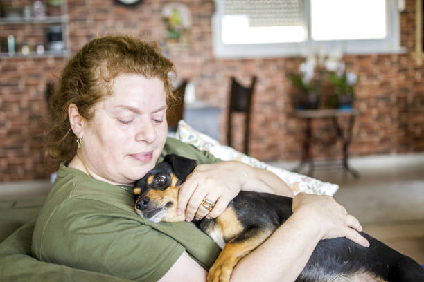 istock Women resting with her dog 1346497465
