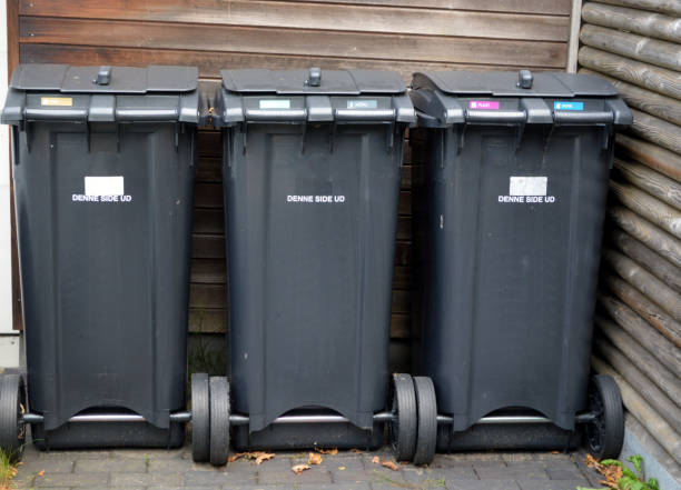 istock Sorting Garbage for recycling  in Rudersdal, Denmark: Cardboard, paper, plastic, glass and metal. 1346499054