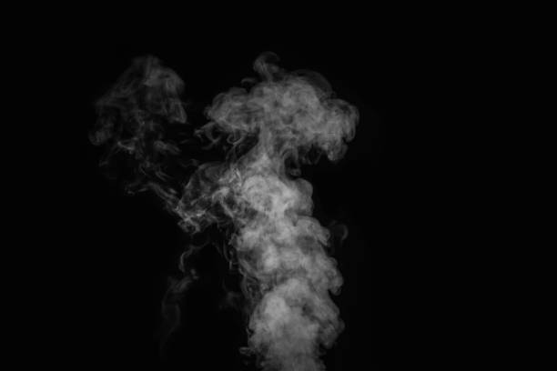 istock Curly white steam, Fog or smoke isolated transparent special effect on black background. Layout for collages. 1346500256