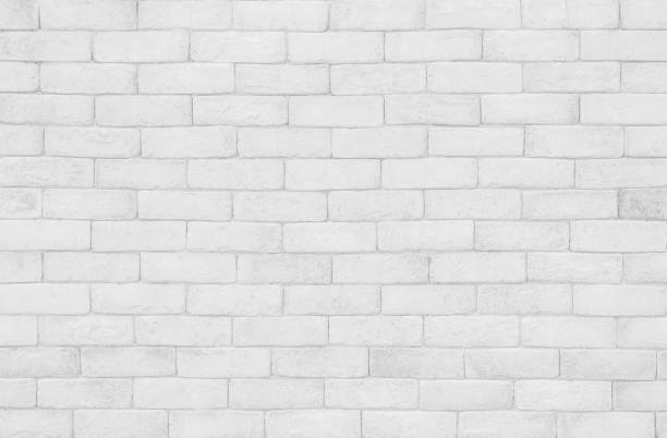 istock White grunge brick wall texture background for stone tile block painted in grey light color wallpaper modern interior and exterior and room backdrop design 1346502890