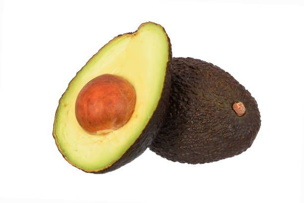 istock Avocado peeled cutted into half closed up isolated on white 1346503892