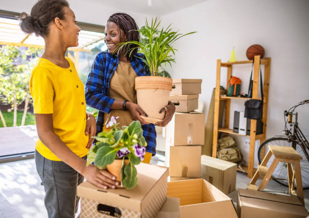 istock Family moving into a new home 1346506628